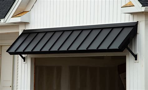 houses with metal window aweningns|types of window awnings.